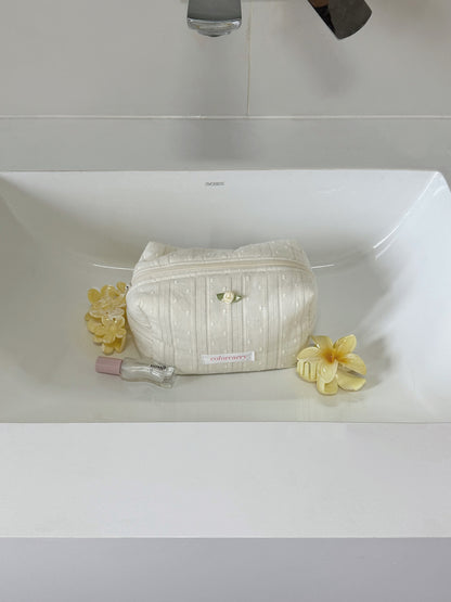 Beige lace makeup pouch in a soft lifestyle scene, Colorcarry