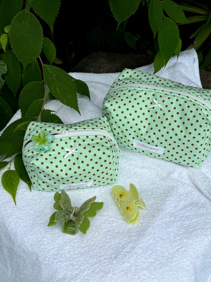 Soft cotton mint dot makeup pouch in a relaxed lifestyle scene, Colorcarry