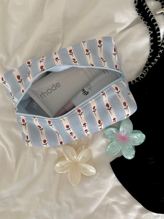 Gentle blue satin makeup bag with subtle rose stripes, adding a calm touch to your routine, Colorcarry
