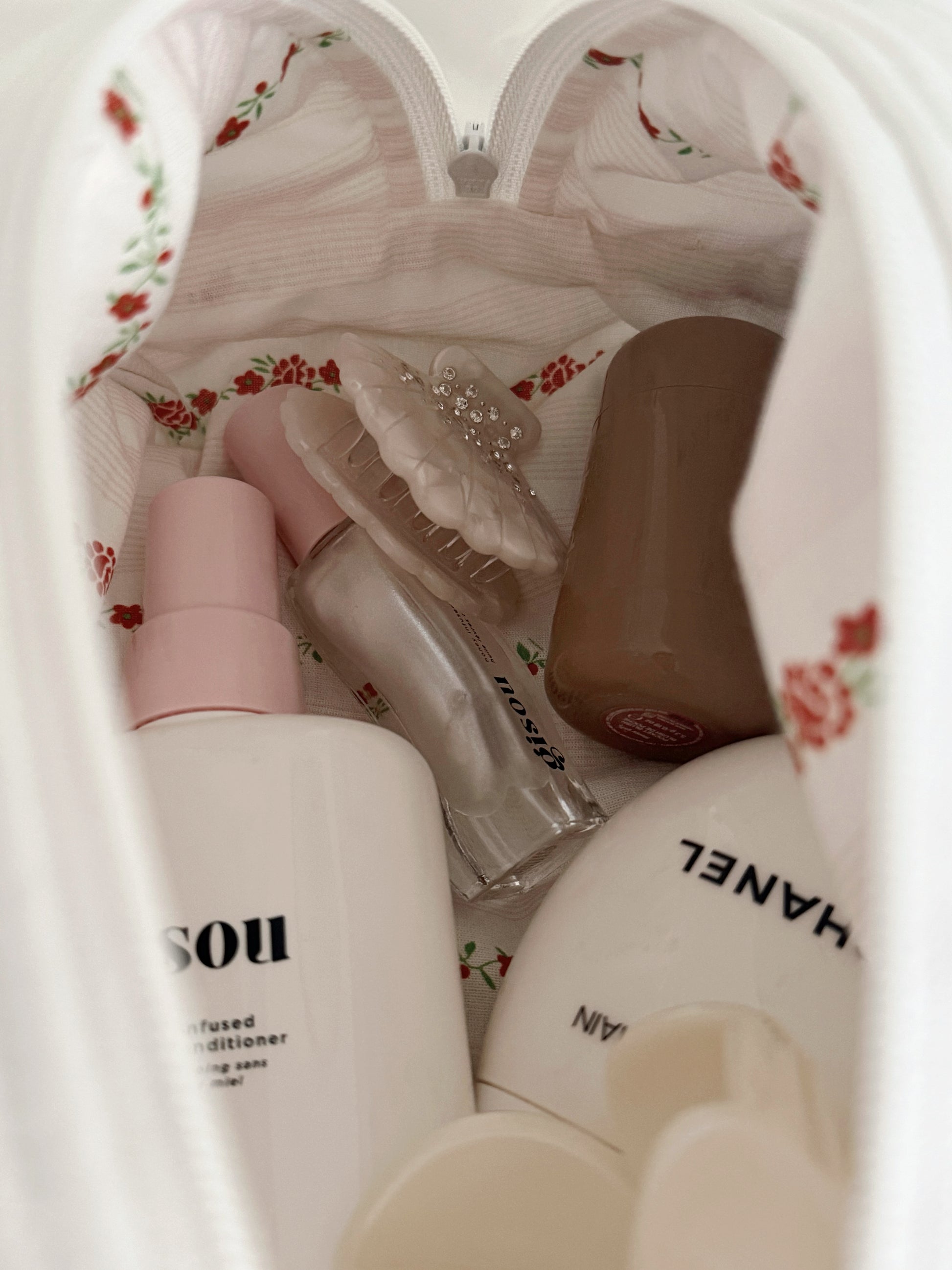 Soft Bloom Cotton Makeup Pouch in white, holding makeup essentials, Colorcarry