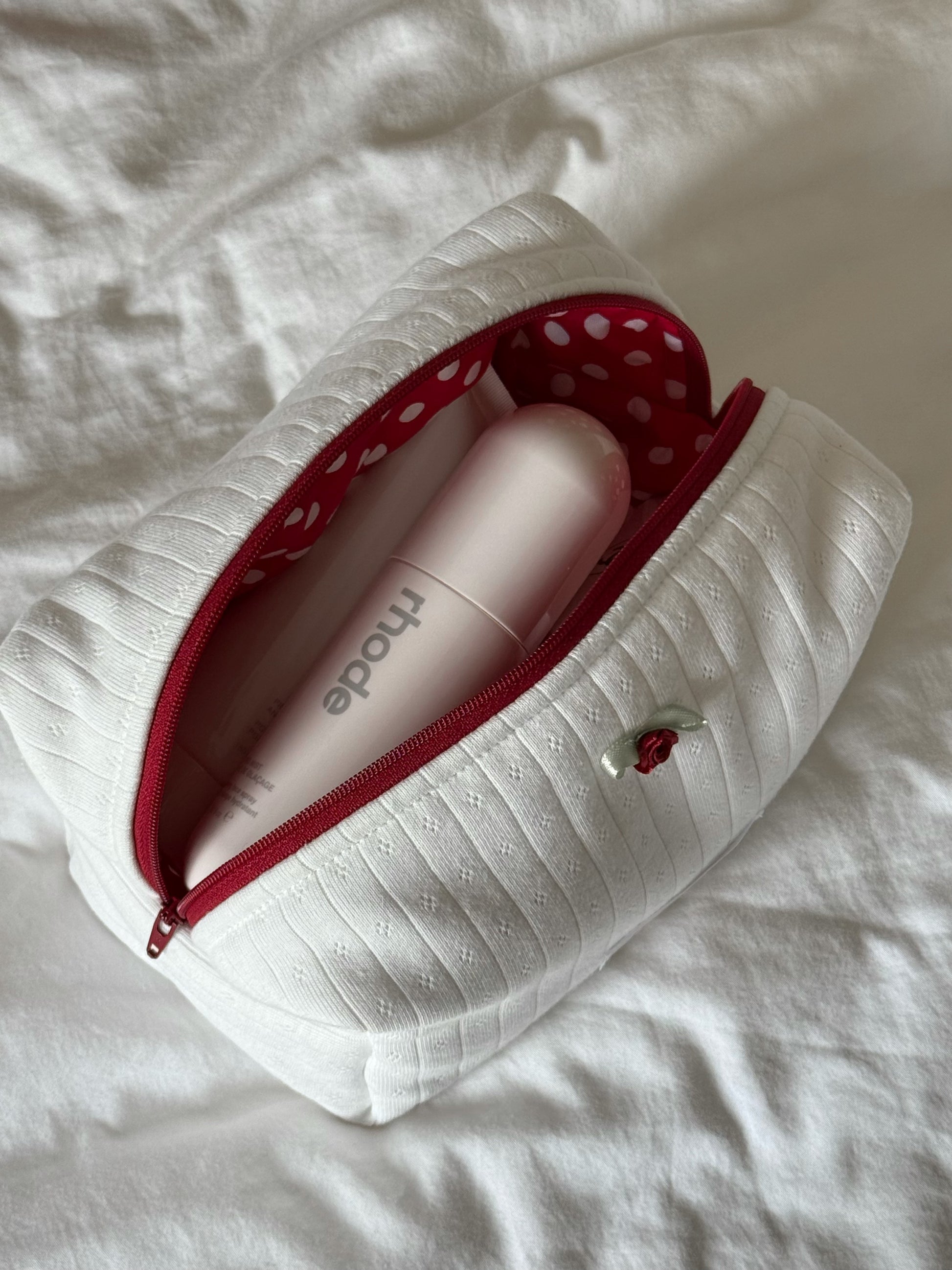 White Soft Rib Knit Makeup Pouch in everyday use, holding makeup and small essentials, Colorcarry